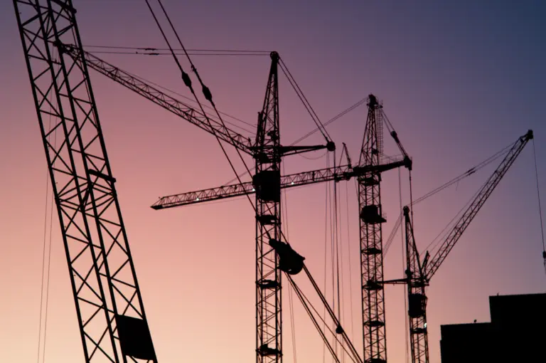 Tower cranes at an active construction site