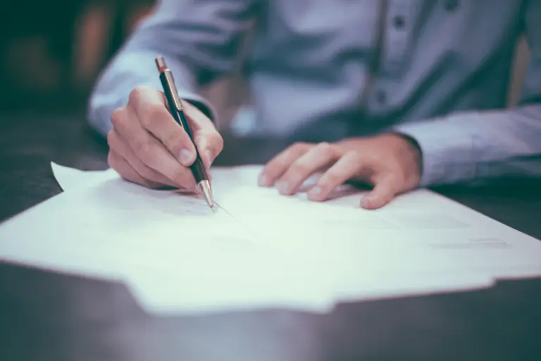 Legal documents being signed for estate planning