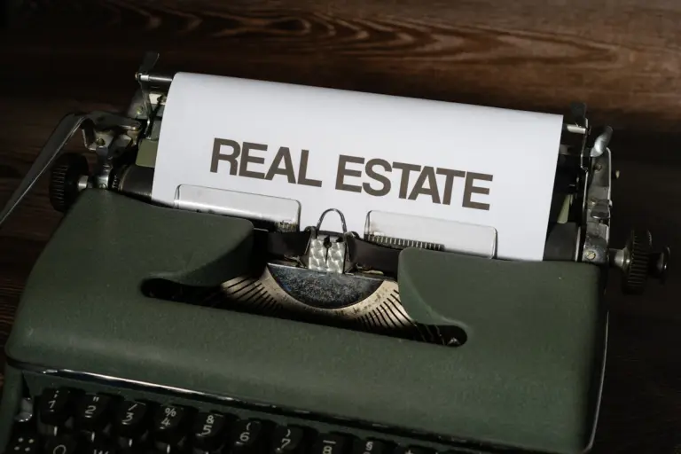 Real estate paperwork and contract documents for a property transaction
