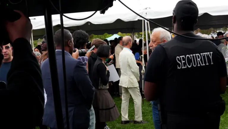 Security personnel monitoring an event gathering